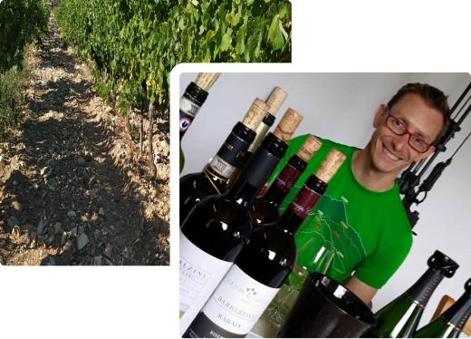 photo de stanislas rocher devant des bouteilles de vin