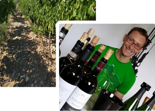 photo de stanislas rocher devant des bouteilles de vin
